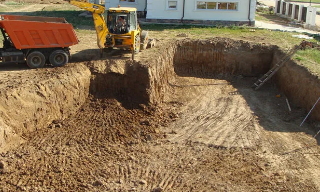 Рытье котлованов под фундамент в Снежинске – цена от 2603 руб. за м3 | 2Землекопа-Снж